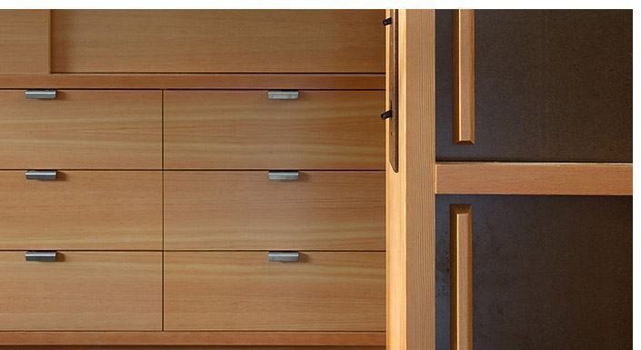 Fir cabinet drawers with brushed-steel pulls — Anders Residence
