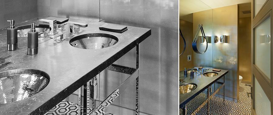 Black Residence powder room with brass walls and hammered metal sinks