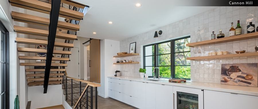 Cannon Hill interior — white oak stair, kitchen, and casework