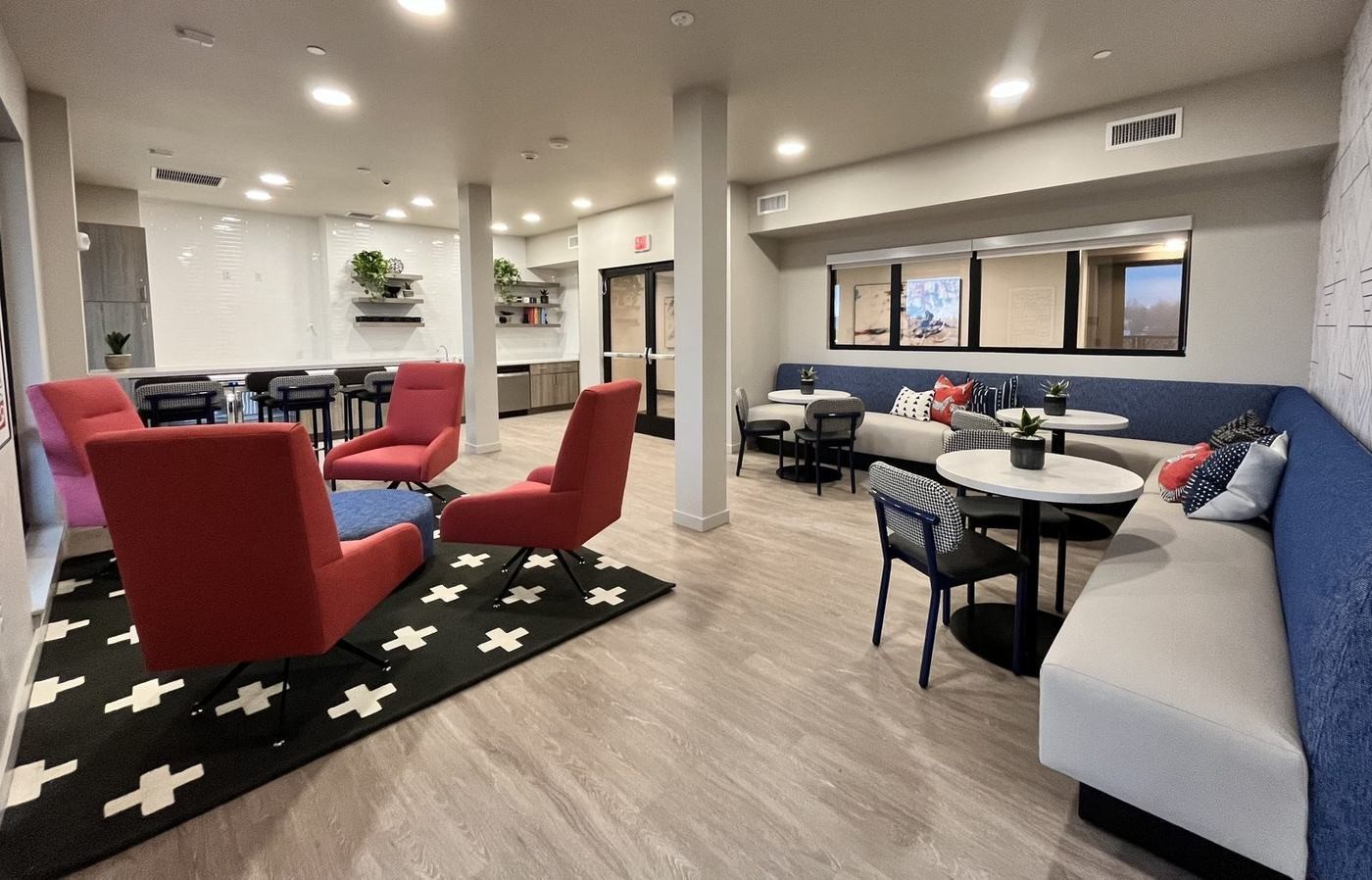 Community clubroom with lounge seating and kitchen
