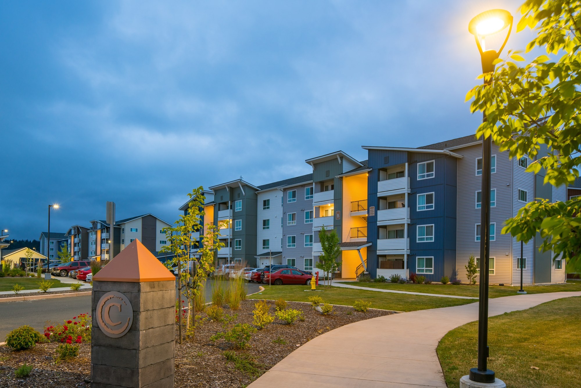 Copper Gate garden apartment community at dusk