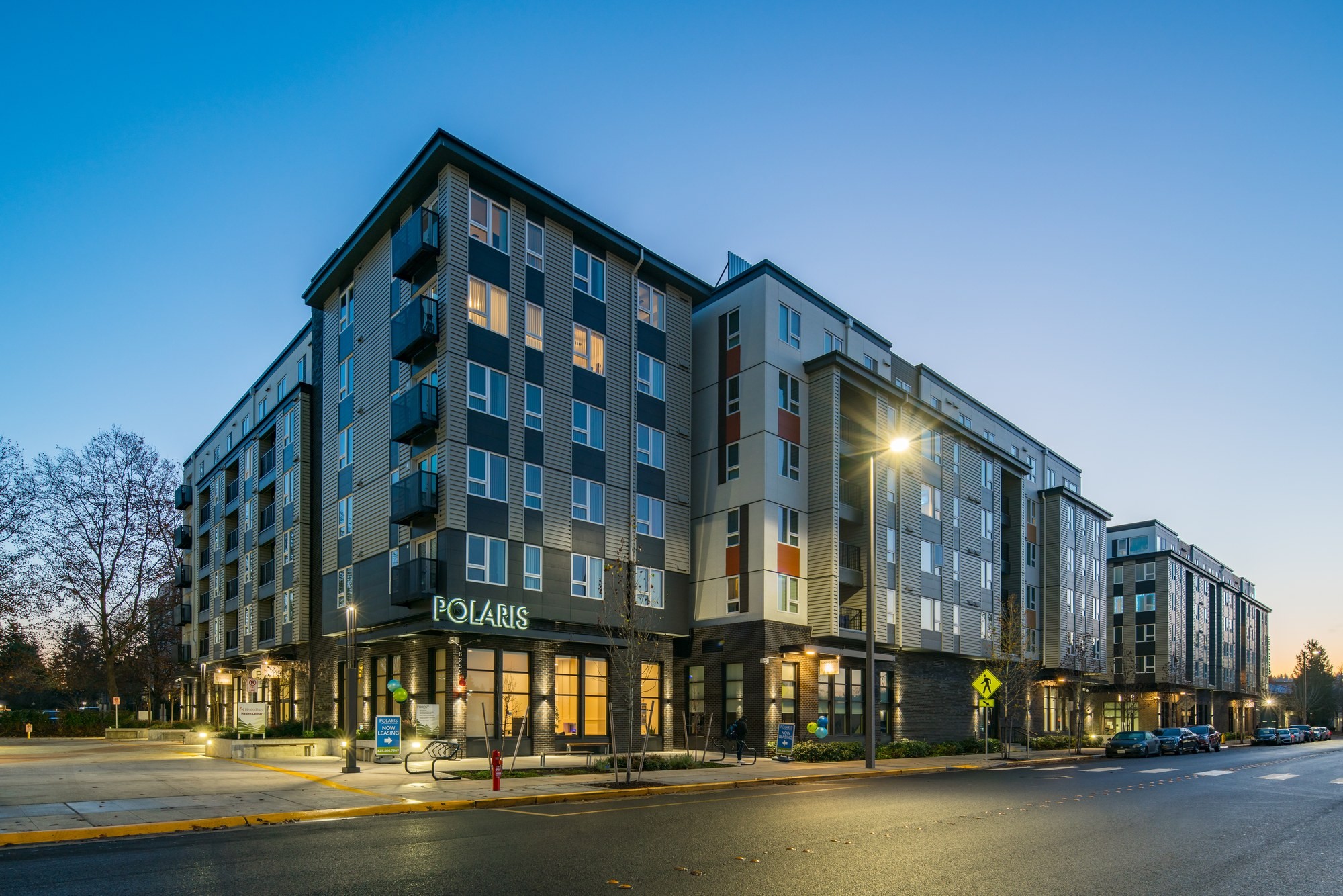 Together Center multi-family development at dusk