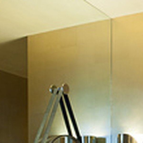 Satin brass surround — Black Residence powder room